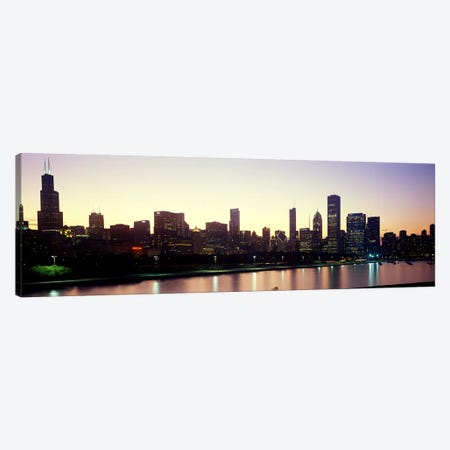 City skyline with Lake Michigan and Lake Shore Drive in foreground at dusk, Chicago, Illinois, USA Canvas Print #PIM10688} by Panoramic Images Canvas Wall Art