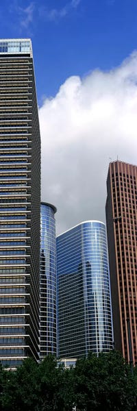 Houston: Low angle view of buildings in a city, Wedge Tower, ExxonMobil Building, Chevron Building, Houston, Texas, USA by Panoramic Images