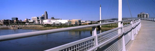 Omaha: Bridge across a river, Bob Kerrey Pedestrian Bridge, Missouri River, Omaha, Nebraska, USA by Panoramic Images