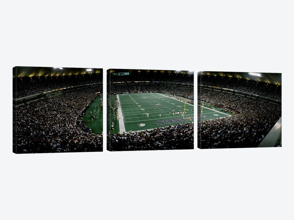 Spectators in an American football stadiumHubert H. Humphrey Metrodome, Minneapolis, Minnesota, USA by Panoramic Images 3-piece Canvas Print