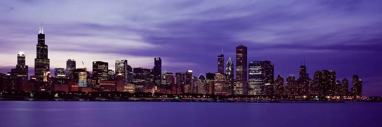 Skyscrapers in a city lit up at night, Chicago, Illinois, USA