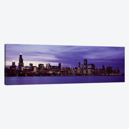 Skyscrapers in a city lit up at night, Chicago, Illinois, USA Canvas Print #PIM10852} by Panoramic Images Canvas Art Print