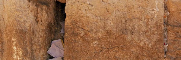 Ancient Ruins: Person praying in front of Western Wall, Jerusalem, Israel by Panoramic Images