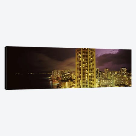 Buildings lit up at night, Honolulu, Oahu, Hawaii, USA Canvas Print #PIM10867} by Panoramic Images Art Print