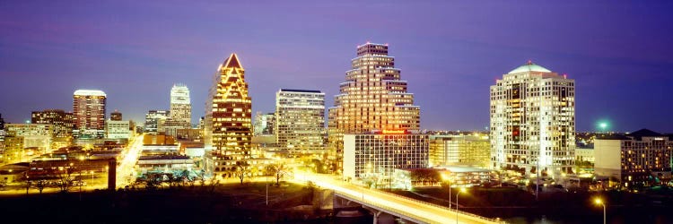 Buildings lit up at dusk, Austin, Texas, USA