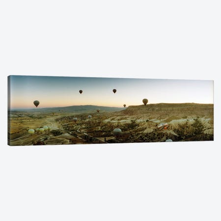 Hot air balloons over landscape at sunrise, Cappadocia, Central Anatolia Region, Turkey Canvas Print #PIM10895} by Panoramic Images Canvas Art
