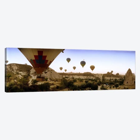 Hot air balloons over landscape at sunrise, Cappadocia, Central Anatolia Region, Turkey #3 Canvas Print #PIM10897} by Panoramic Images Canvas Art