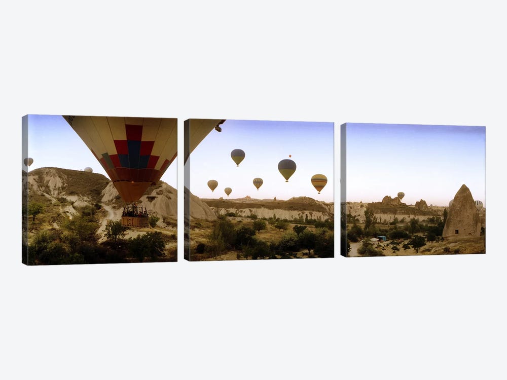Hot air balloons over landscape at sunrise, Cappadocia, Central Anatolia Region, Turkey #3 by Panoramic Images 3-piece Canvas Print