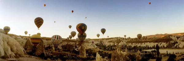 Extreme Sports: Hot air balloons over landscape at sunrise, Cappadocia, Central Anatolia Region, Turkey #4 by Panoramic Images