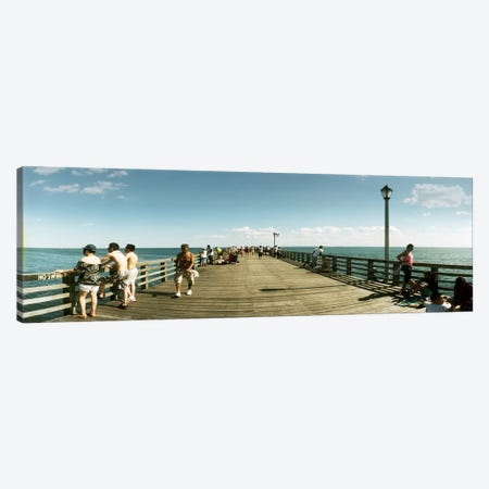 Tourists on the beach at Coney Island viewed from the pier, Brooklyn, New York City, New York State, USA Canvas Print #PIM10932} by Panoramic Images Canvas Artwork