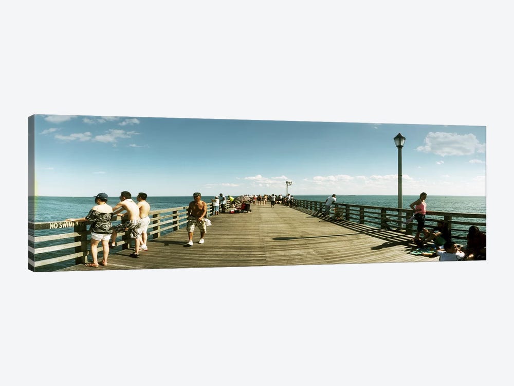 Tourists on the beach at Coney Island viewed from the pier, Brooklyn, New York City, New York State, USA by Panoramic Images 1-piece Art Print