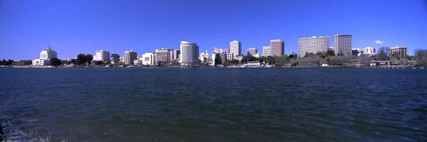 Skyscrapers along a lake, Lake Merritt, Oakland, California, USA