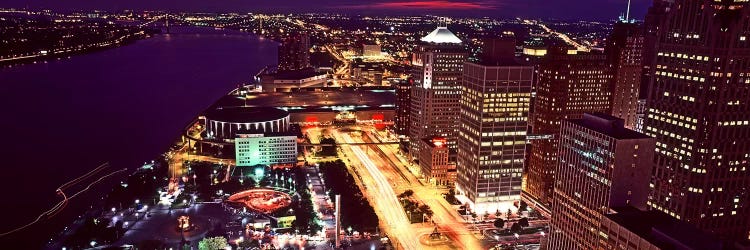 High angle view of buildings lit up at night, Detroit, Michigan, USA