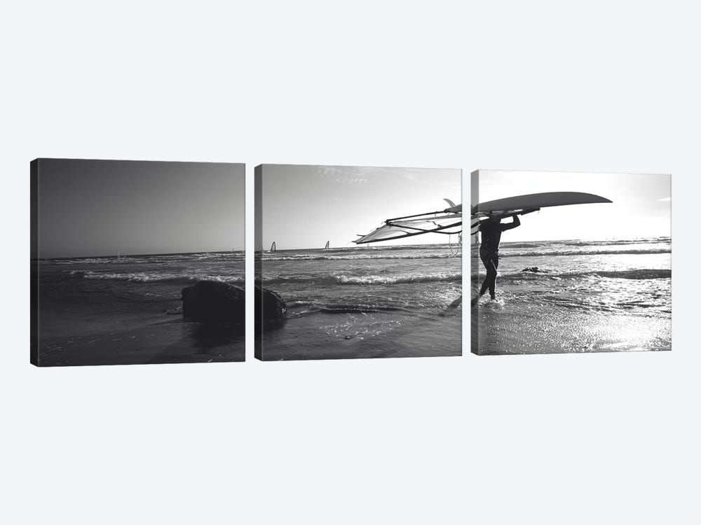 Man carrying a surfboard over his head on the beach, Santa Cruz, California, USA by Panoramic Images 3-piece Canvas Artwork