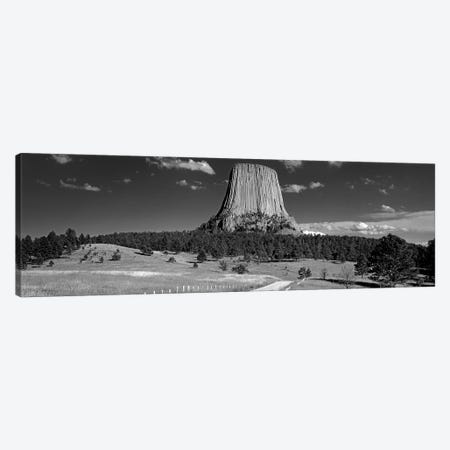 USA, Wyoming, Devils Tower National Monument, Low angle view of a natural rock formation (Black And White) Canvas Print #PIM11167} by Panoramic Images Canvas Art Print