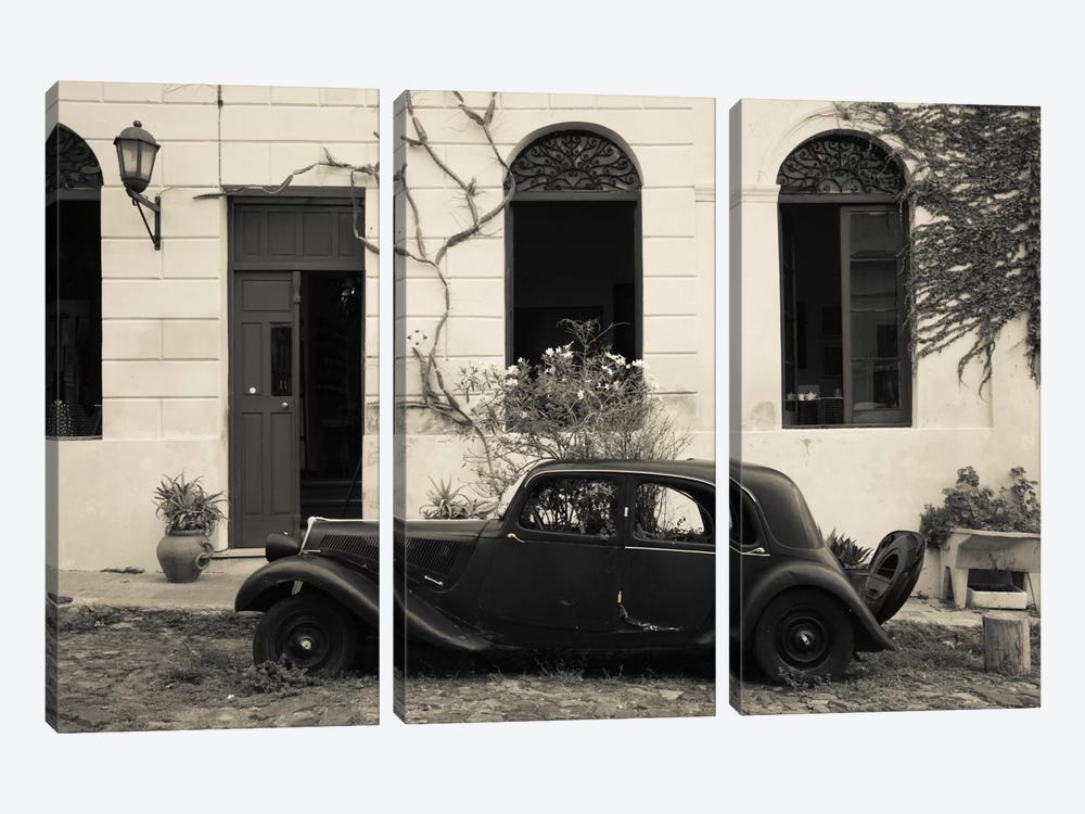 Vintage car parked in front of a house, Calle De Portugal, Colonia Del Sacramento, Uruguay by Panoramic Images 3-piece Canvas Print