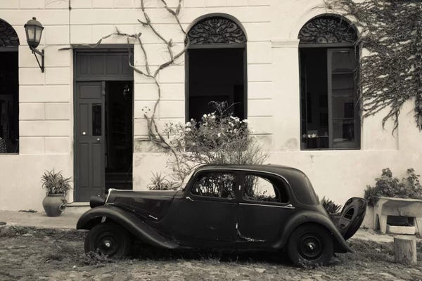 Uruguay: Vintage car parked in front of a house, Calle De Portugal, Colonia Del Sacramento, Uruguay by Panoramic Images