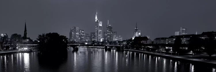 Reflection of buildings in water at night, Main River, Frankfurt, Hesse, Germany