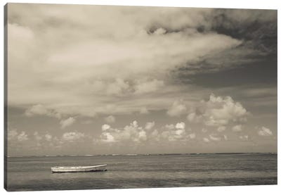 Seascape with a small boat, Playa Luquillo Beach, Luquillo, Puerto Rico Canvas Art Print - Puerto Rico Art