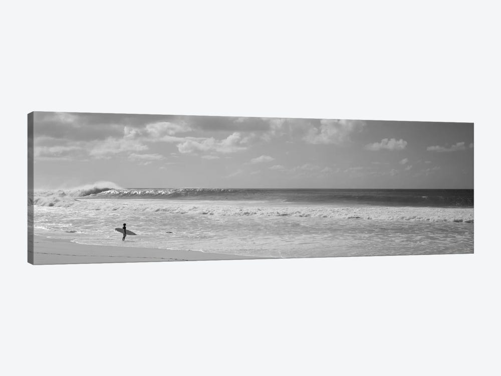 Surfer standing on the beach, North Shore, Oahu, Hawaii, USA by Panoramic Images 1-piece Canvas Wall Art