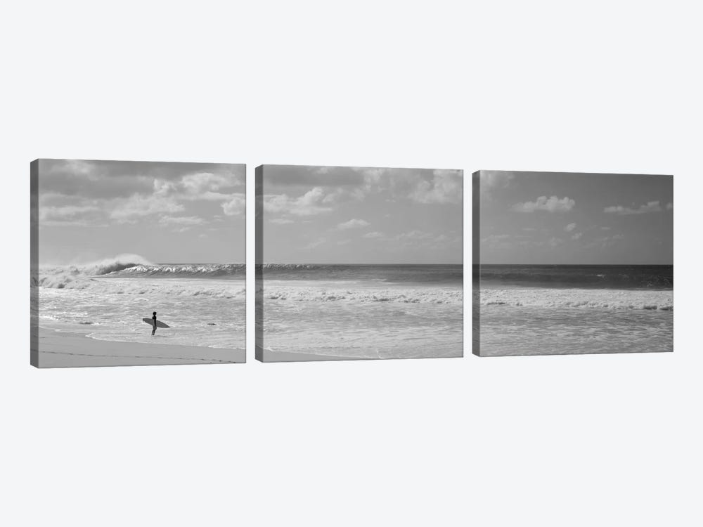 Surfer standing on the beach, North Shore, Oahu, Hawaii, USA by Panoramic Images 3-piece Canvas Artwork