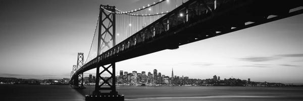 Bridges: Bridge across a bay with city skyline in the background, Bay Bridge, San Francisco Bay, San Francisco, California, USA #2 by Panoramic Images