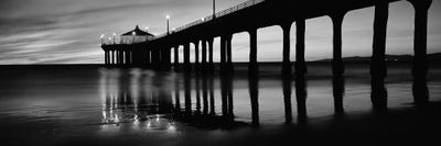 Low angle view of a pier, Manhattan Beach Pier, Manhattan Beach, Los Angeles County, California, USA by Panoramic Images canvas print