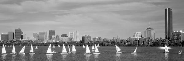 Massachusetts: USA, Massachusetts, Boston, Charles River, View of boats on a river by a city by Panoramic Images