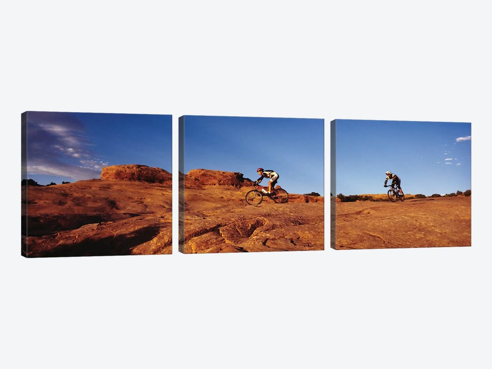 Two people mountain biking, Moab, Utah, USA by Panoramic Images 3-piece Canvas Artwork