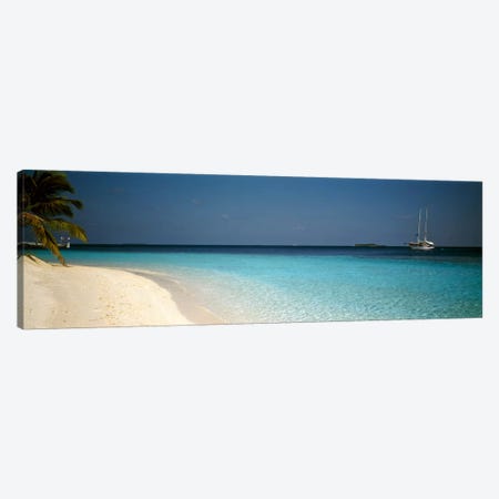 Beach & Boat Scene The Maldives Canvas Print #PIM1198} by Panoramic Images Canvas Print