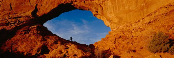 Lone Mountain Biker, North Window Arch, Arches National Park, Utah, USA