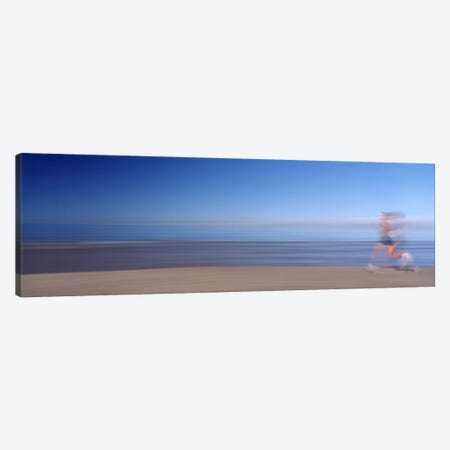 Blurred Motion Side Profile Of A Woman Running On The Beach Canvas Print #PIM12101} by Panoramic Images Canvas Artwork