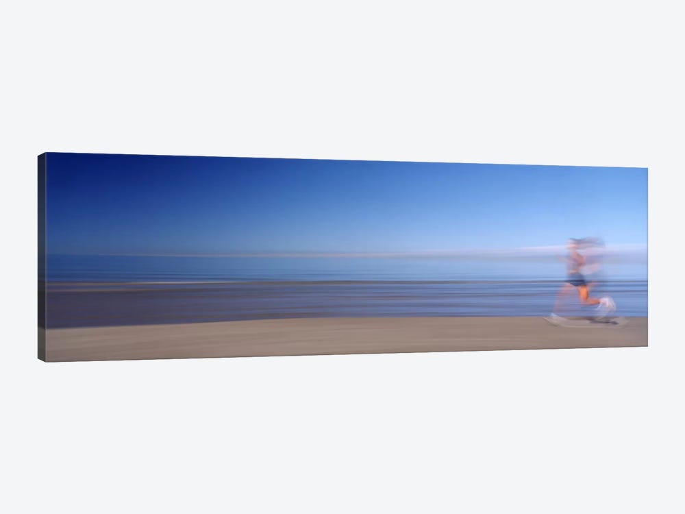 Blurred Motion Side Profile Of A Woman Running On The Beach by Panoramic Images 1-piece Canvas Wall Art