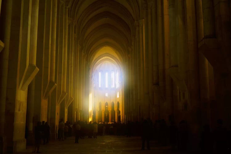 Group of people in the hallway of a cathedral, Alcobaca, Portugal