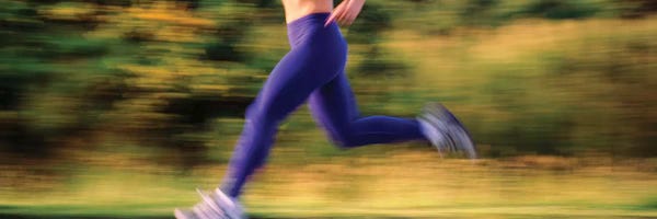 Athletes: Low section of a female athlete by Panoramic Images