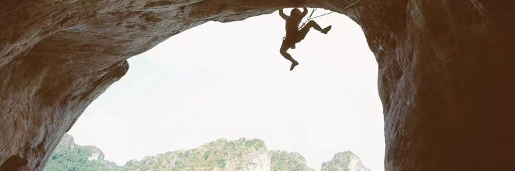 Silhouette Of A Man Climbing A Rock, Railay Beach, Krabi, Thailand