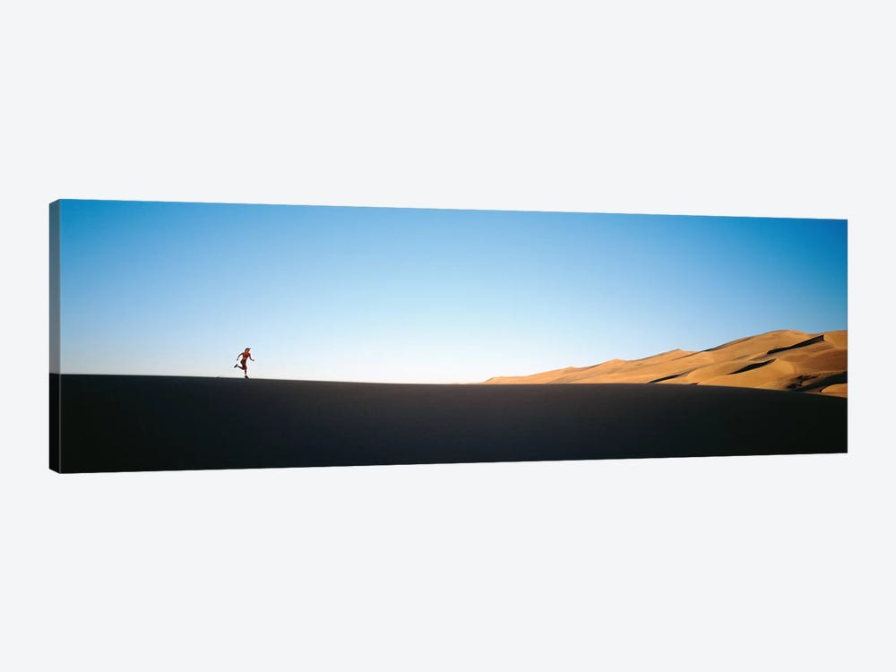 Low angle view of a woman running in the desert 2, Great Sand Dunes National Monument, Colorado, USA by Panoramic Images 1-piece Canvas Art