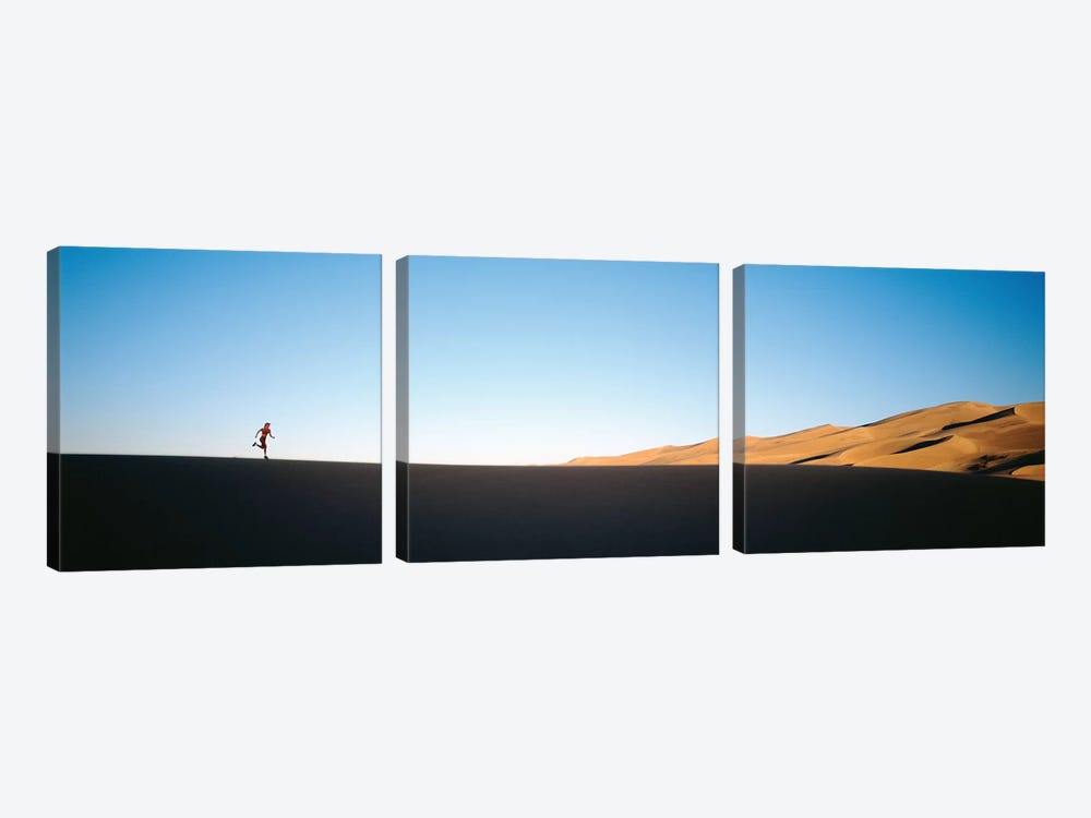 Low angle view of a woman running in the desert 2, Great Sand Dunes National Monument, Colorado, USA by Panoramic Images 3-piece Canvas Art