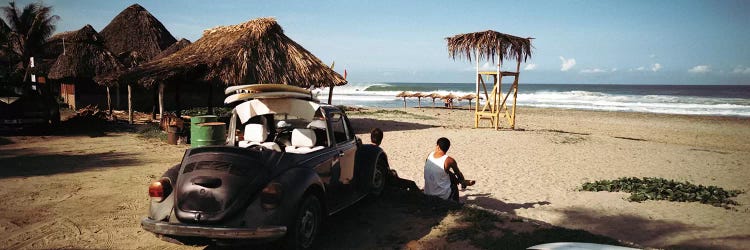 Surfers watching waves, Zicatela Beach, Mexico