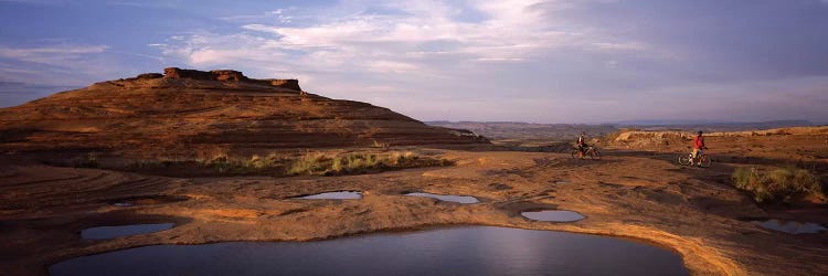 Mountain bike riders on a trail, Slickrock Trail, Sand Flats Recreation Area, Moab, Utah, USA