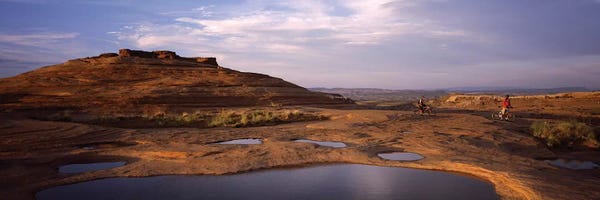 Moab: Mountain bike riders on a trail, Slickrock Trail, Sand Flats Recreation Area, Moab, Utah, USA by Panoramic Images