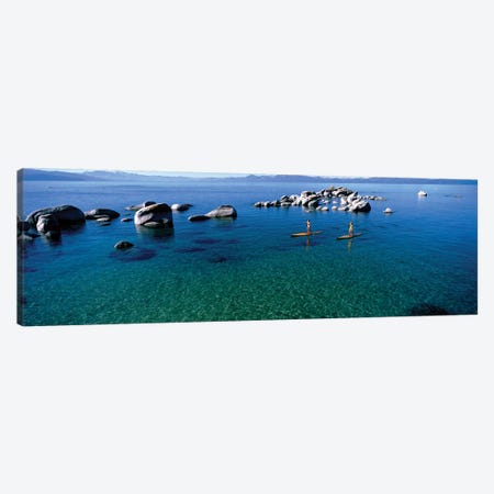 Two women paddle boarding in a lake 2, Lake Tahoe, California, USA Canvas Print #PIM12655} by Panoramic Images Canvas Print