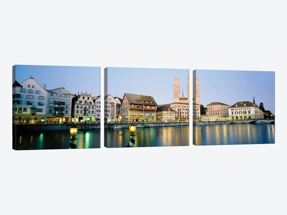 Riverfront Architecture At Twilight Featuring Grossmunster, Limmat River, Zurich, Switzerland by Panoramic Images 3-piece Canvas Art