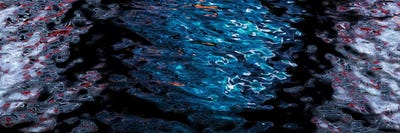 Close-Up Of Reflection Of Wheels On Water by Panoramic Images multi panel art