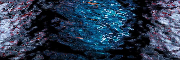 Close-Up Of Reflection Of Wheels On Water