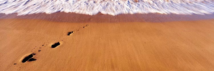 Footprints In Sand On The Beach, Hawaii, USA