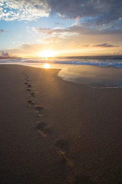 Cloudy Sunsets: Footprints On The Beach At Sunset, Oahu, Hawaii, USA by Panoramic Images