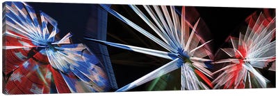 Low Angle View Of Wheels Canvas Art Print - Ferris Wheels