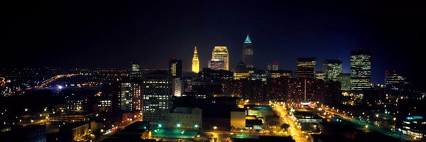 Aerial view of a city lit up at nightCleveland, Ohio, USA