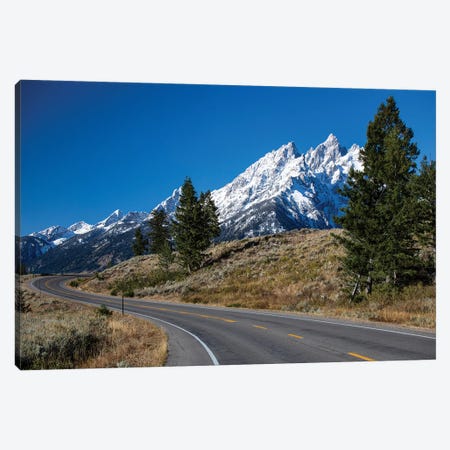 Road With Mountain Range In The Background, Teton Range, Grand Teton National Park, Wyoming, USA Canvas Print #PIM14847} by Panoramic Images Canvas Artwork